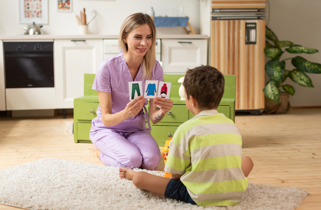 Therapist and child in a guided learning activity