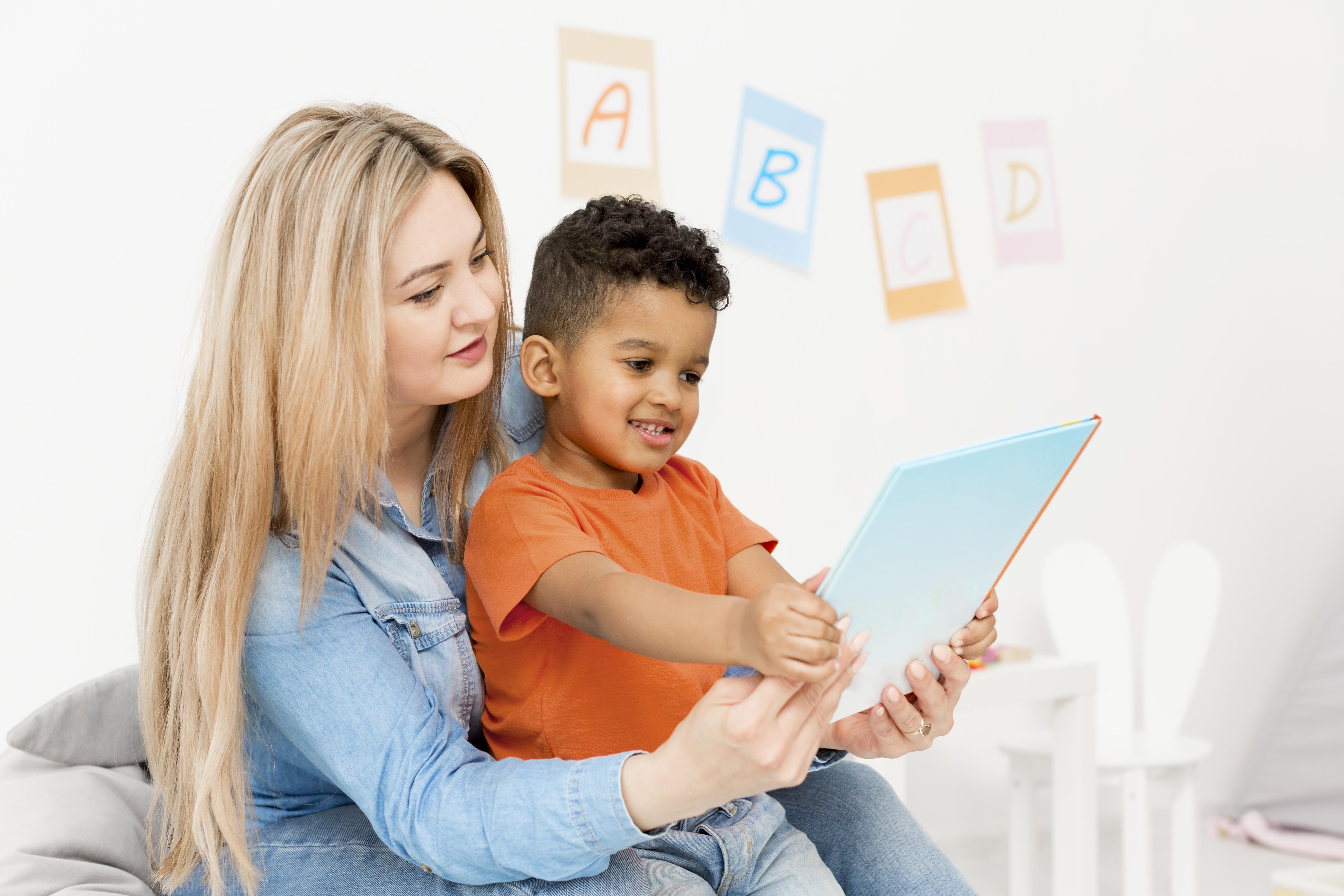 Caregiver supporting child during learning